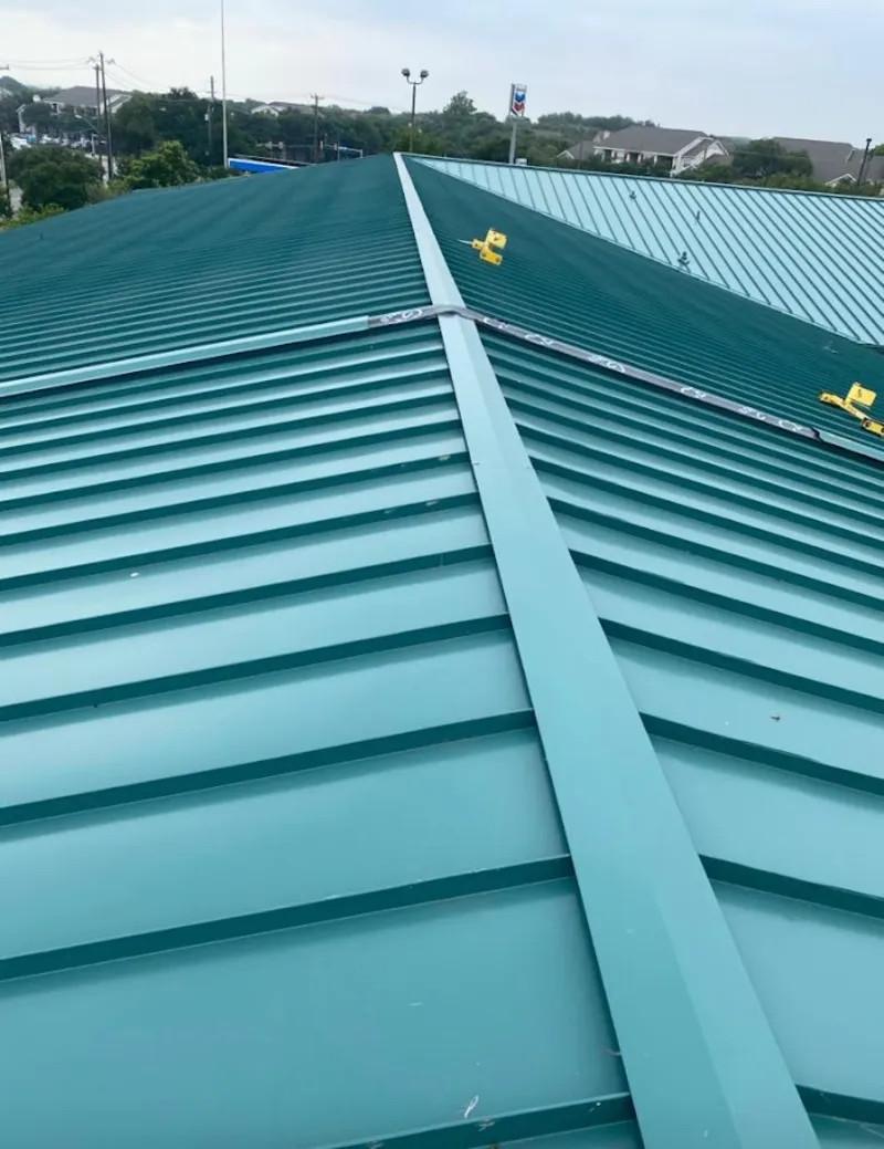 Green commercial metal roof ridge and valley for Metal Roof Repair in Meadville